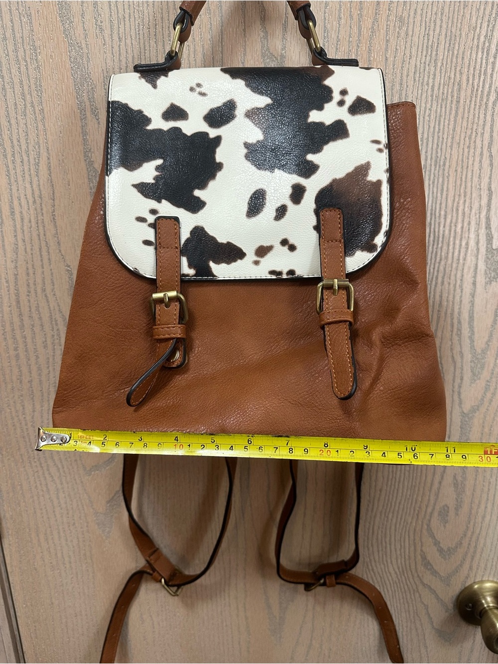 Jen & Co Brooks Convertible Cow Print Faux Leather Backpack - Picture 12 of 12